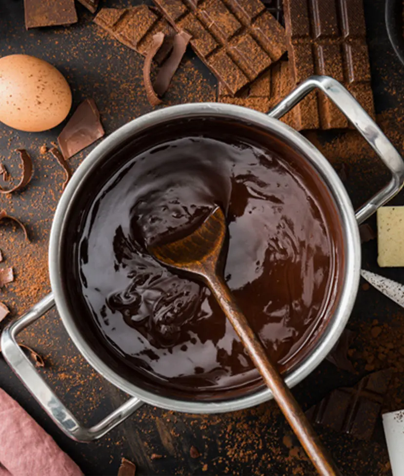 Photograph of a pot of chocolate pudding being made from scratch
